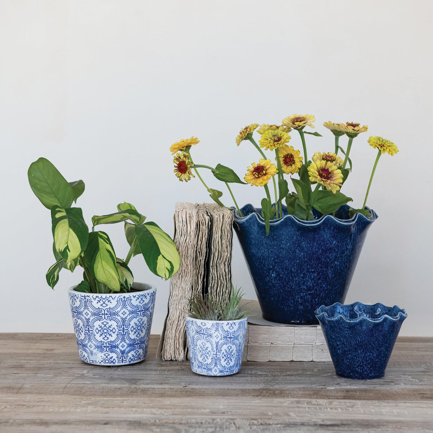 Creative Co-Op Stoneware Planter with Ruffled Edge and Drainage Hole with Reactive Glaze, Blue