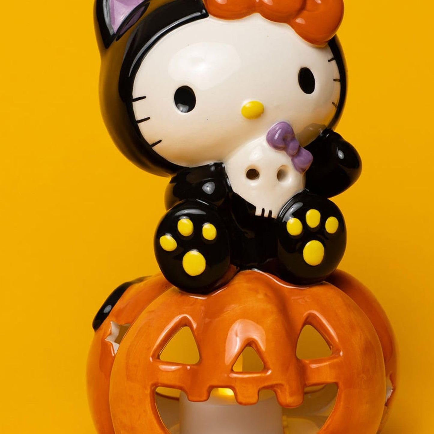 Hello Kitty Halloween Tealight Holder, 4.25" L x 4" W x 6.75" H Created by Blue Sky Clayworks