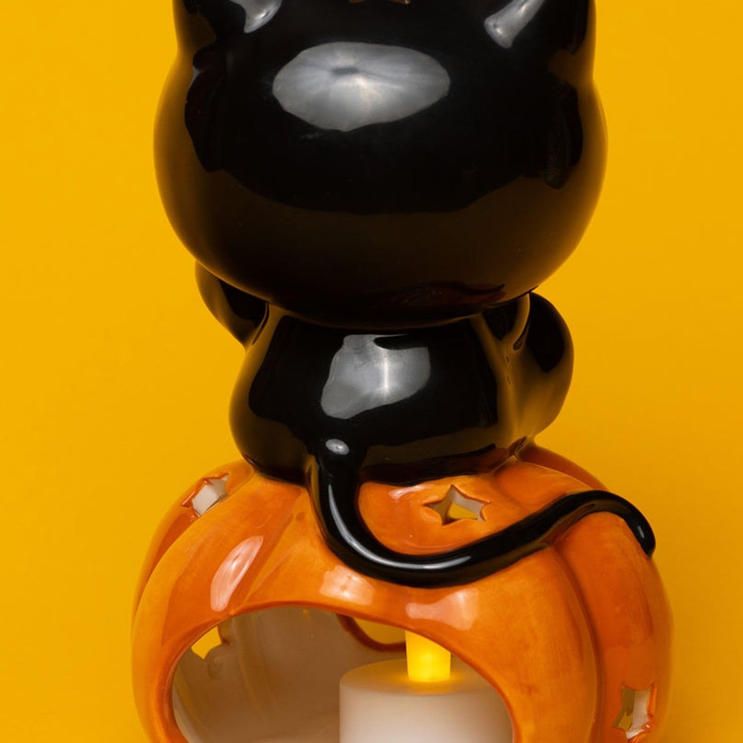 Hello Kitty Halloween Tealight Holder, 4.25" L x 4" W x 6.75" H Created by Blue Sky Clayworks