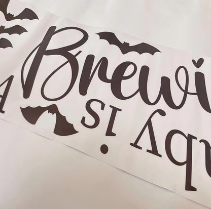 A Baby is Brewing With Bats Welcome Sign Decal for Halloween Witchy Baby Shower, October Fall Season, Haunted House Backdrop
