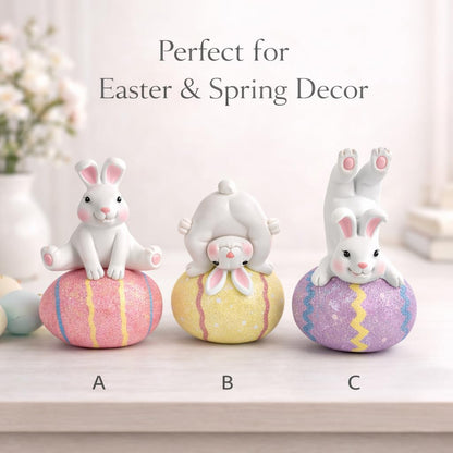 GoGnome Easter Decoration Indoor, Set of 3 Resin Easter Bunny Figurines on Pastel Eggs – 6.5''H Playful Rabbit Spring Decor for Shelf, Mantel & Tabletop (Pink/Yellow/Purple)