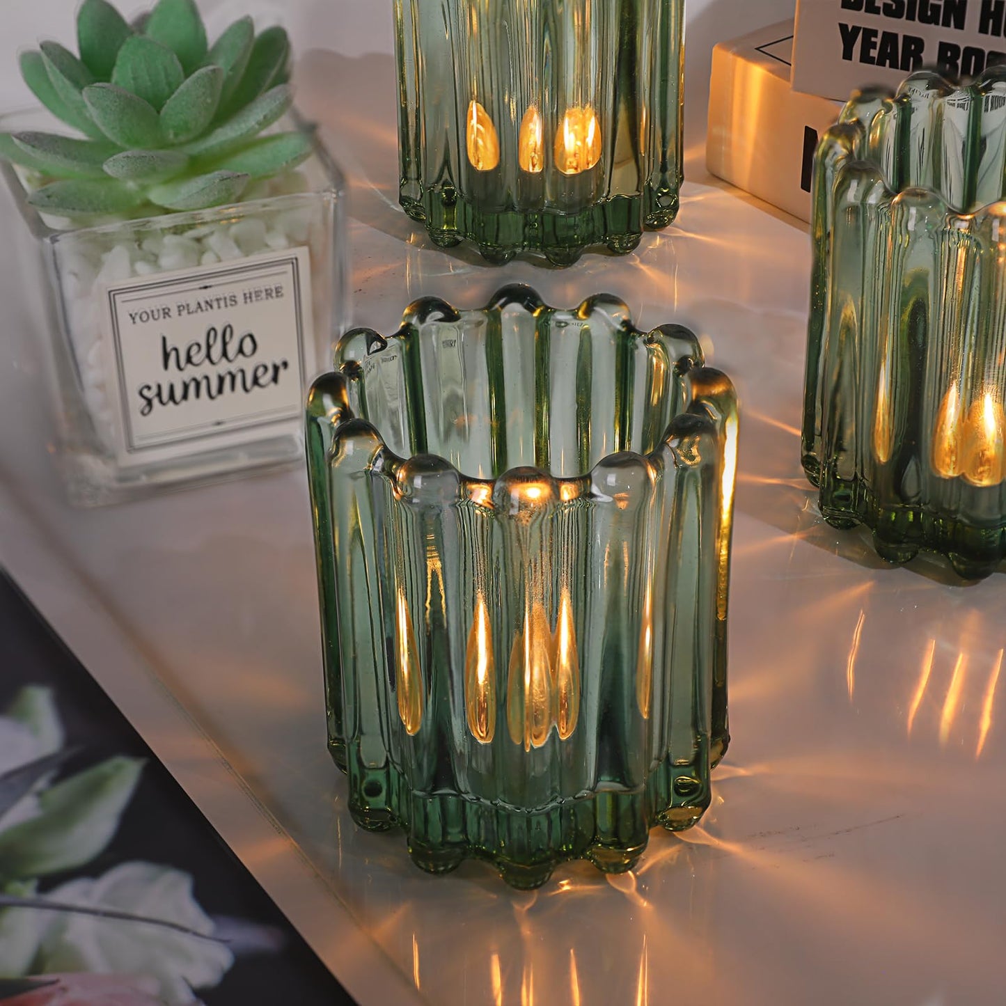HAVITI Glass Green Votive Candle Holder, Ribbed Votive Candle Holders Set of 12, Tealight Candle Holder for Wedding Centerpieces Dinner Party Table Decor