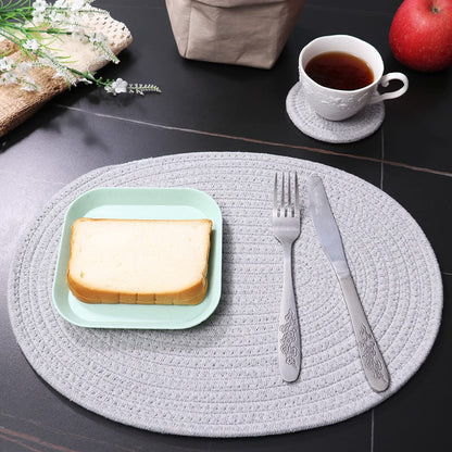 WENFOME 4 Pack Oval Woven Placemats, Gray Cotton Rope Braided Placemats with 4 Pack Round Fabric Coasters, Heat-Resistant Non-Slip Cotton Table Mats Charger Plates for Table Decoration (Gray)