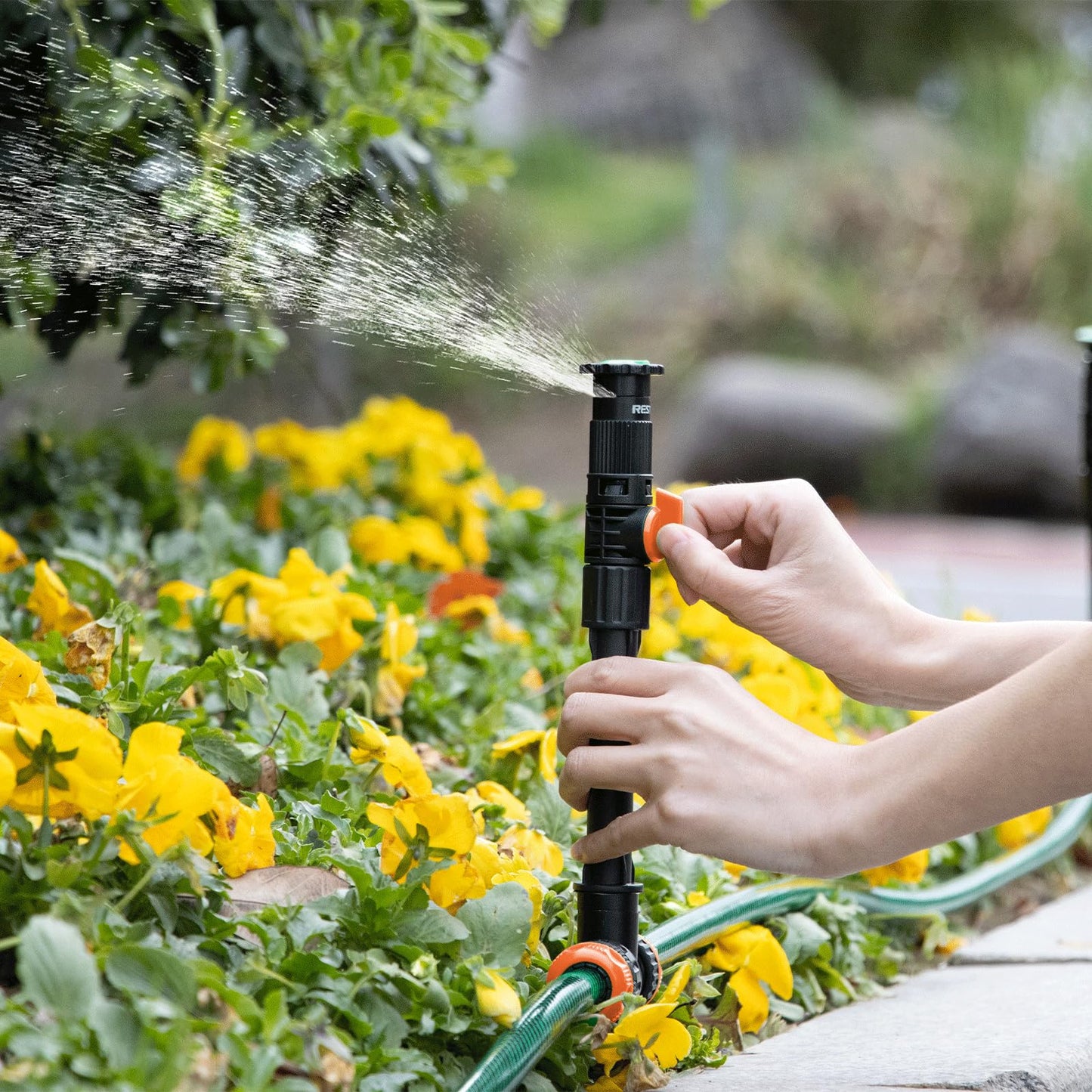 RESTMO Flexible Sprinkler System with Metal Spike Base, Above Ground DIY Irrigation Kit, Multi-Adjustable Lawn Sprinkler Set, Ideal for Plant and Flower Bed Watering, 30ft Garden Hose Included, Orange