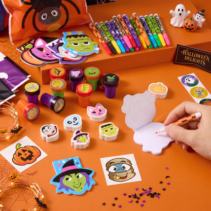 JOYIN 168 Pcs 24 Pack Assorted Halloween Art and Craft Stationery Kids Gift Set Trick or Treat Party Favor Toy Including Halloween Bag, Notepads, Stamps, Pencils, Stickers and Temporary Tattoos