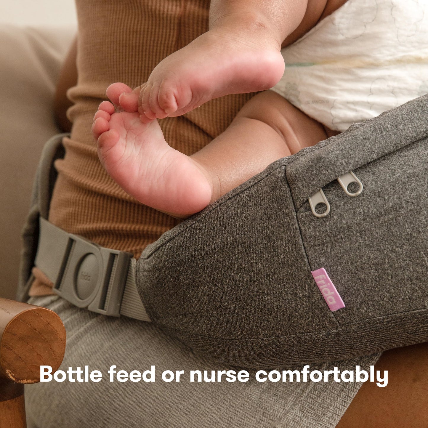 Frida Mom Nursing Pillow, Adjustable Breastfeeding Pillow for Mom & Baby Comfort with Back Support, Customizable Wrap Around Waist Strap, and Pockets for Heat Relief