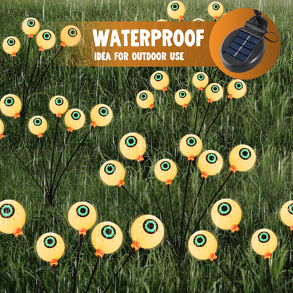 JOYIN Halloween Decorations Outdoor Solar Scary Eyeball Lights, 2 Pcs 12LEDs Warm Pathway Yard Stakes, Waterproof Firefly Lights for Halloween Graveyard Yard Garden Patio Walkway Party
