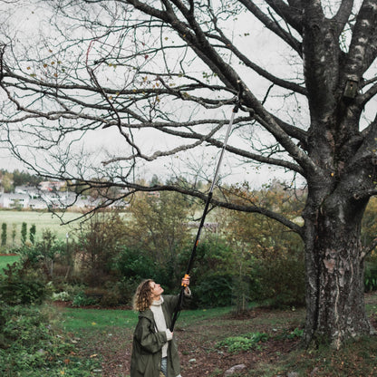 Fiskars 2-in-1 Extendable Tree Pruner and Pole Saw (Extends 7.9 - 12 feet) with Rotating Head, Pruning Stik Model with 15-Inch Double-Grind Saw Blade, and Double Locking System